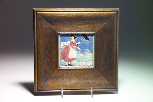 Appraisal: NEWCOMB COLLEGE Hand-built tile modeled with a woman holding a