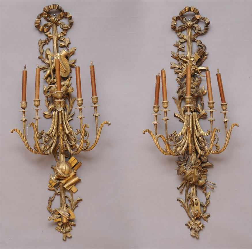 Appraisal: PAIR OF LOUIS XVI STYLE CARVED GILTWOOD FIVE-LIGHT WALL APPLIQUES