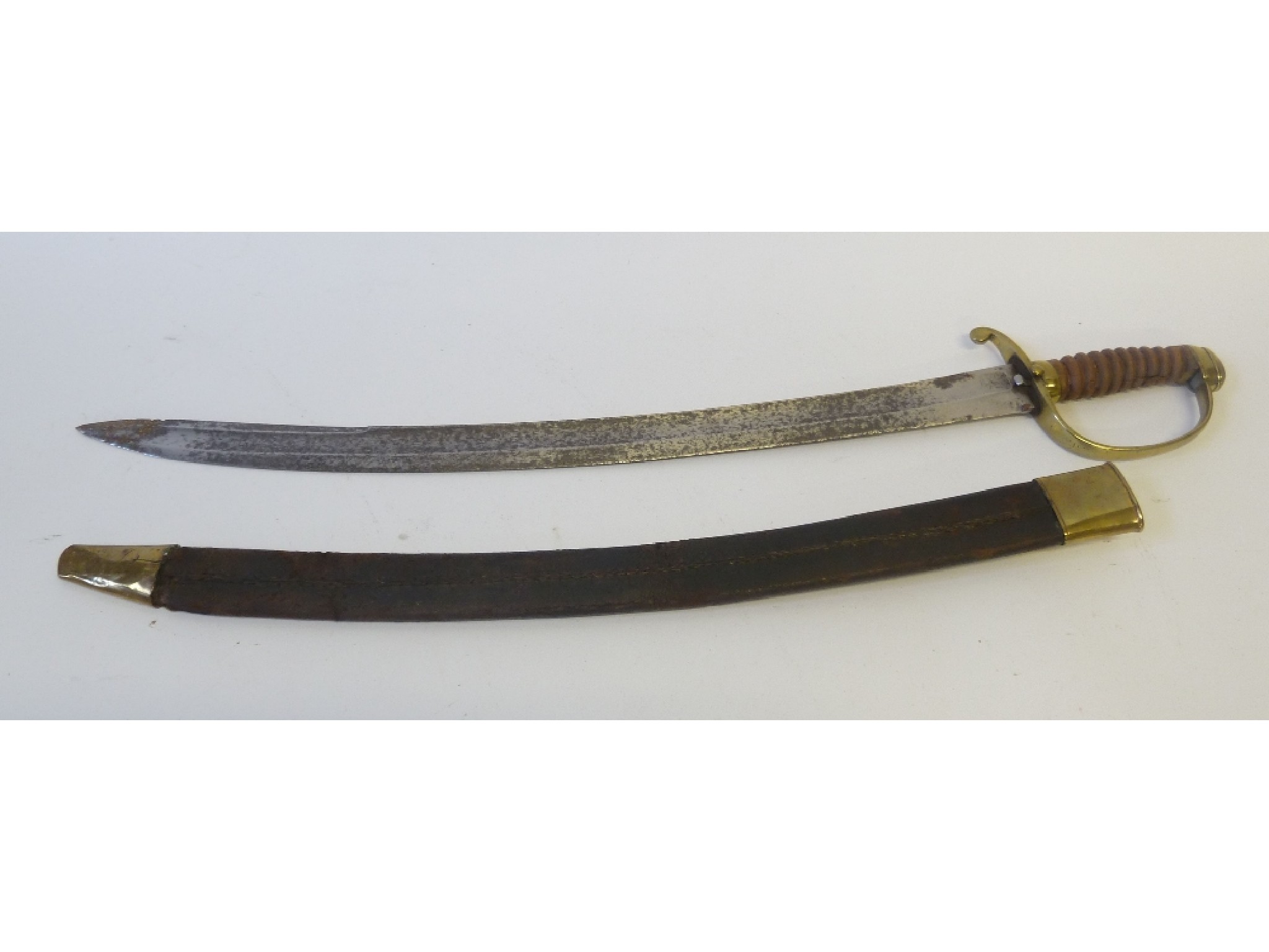 Appraisal: NINETEENTH CENTURY NAVY CUTLASSS the single edge curved fullered blade