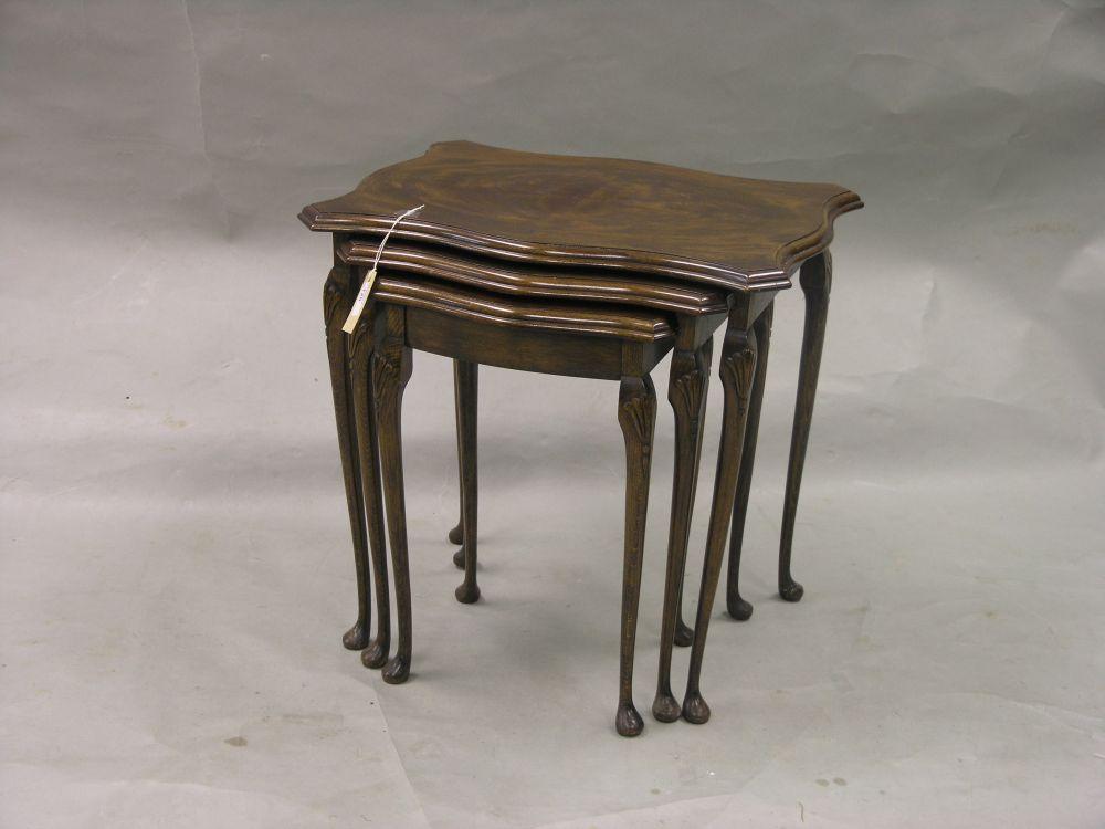 Appraisal: A reproduction Georgian style nest of three tables with quarter