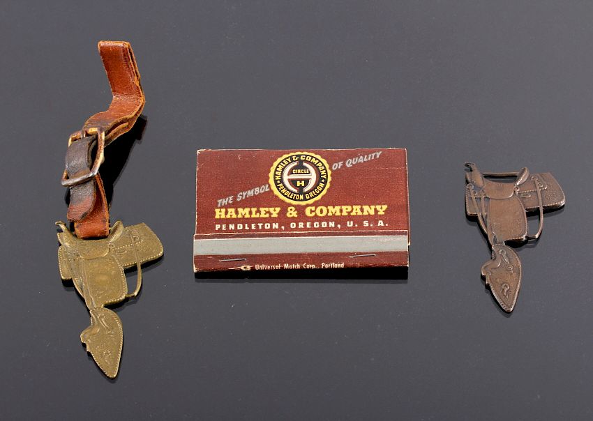 Appraisal: Hamley Saddle Watch Fob Matchbook Collection This is a pair