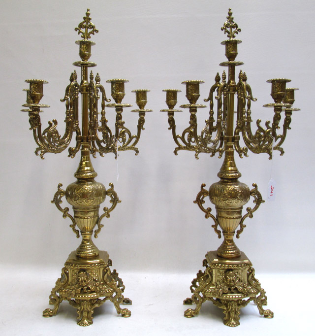 Appraisal: TWO CLASSICAL REVIVAL STYLE BRASS CANDELABRA each having six-light feature