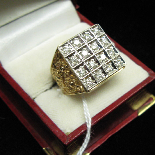 Appraisal: MAN'S DIAMOND FOURTEEN KARAT WHITE AND YELLOW GOLD RING The