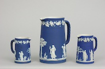 Appraisal: Three Wedgwood Portland Blue Jasper Dip Jugs ca - Lot