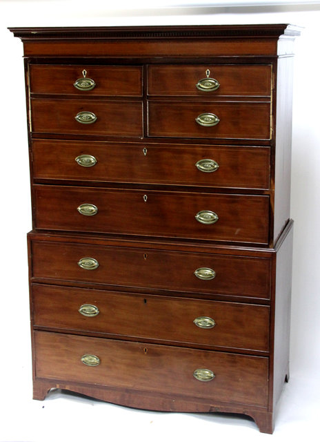 Appraisal: A mahogany chest in two sections the top with false