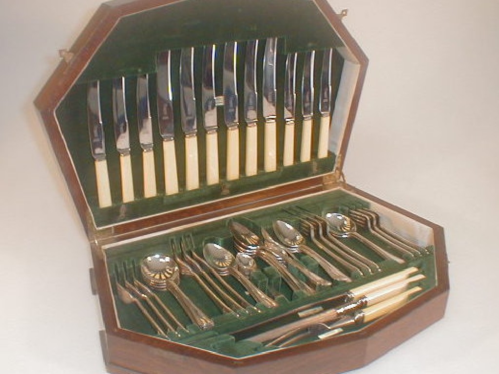 Appraisal: An Art Deco period suite of electroplate cutlery in a