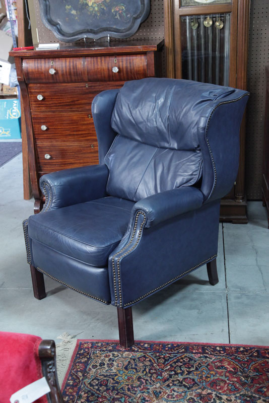 Appraisal: LEATHER WING CHAIR Manufactured by Barcalounger Blue leather reclining wing