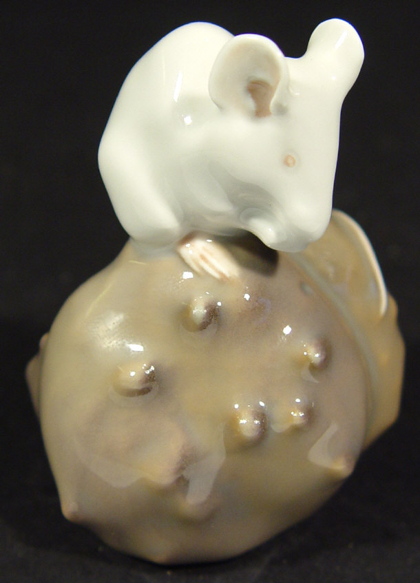 Appraisal: Royal Copenhagen porcelain mouse on a rock with hand painted