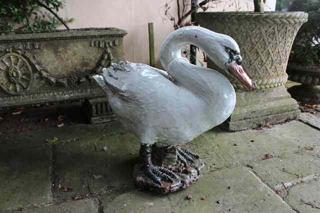 Appraisal: A GLAZED POTTERY SCULPTURE of a swan high