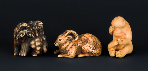 Appraisal: Three Japanese carved ivory netsuke th c to include a