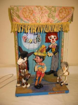 Appraisal: A Pelham puppets electric window display with Donkey Pinocchio Bulldog