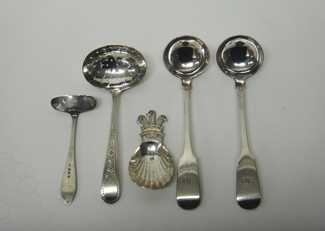 Appraisal: Silver comprising a pair of Scottish fiddle pattern sauce ladles