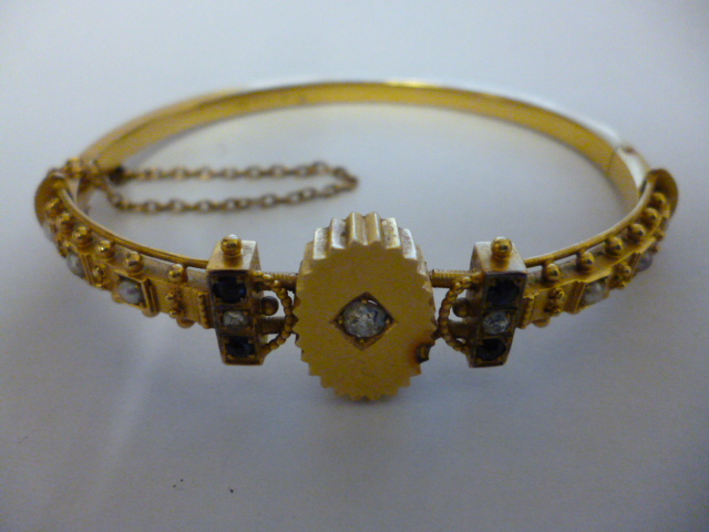 Appraisal: A VICTORIAN CT GOLD STIFF HINGED BANGLE the upper section