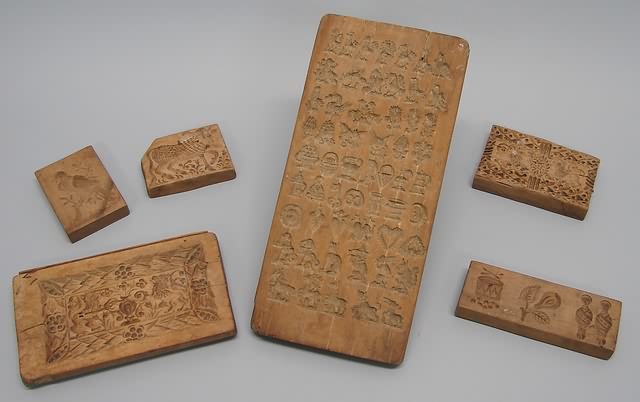 Appraisal: Group of butter molds featuring various designs including drum bird