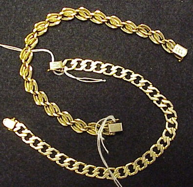 Appraisal: JEWELRY K yellow gold open flat curb link bracelet inches