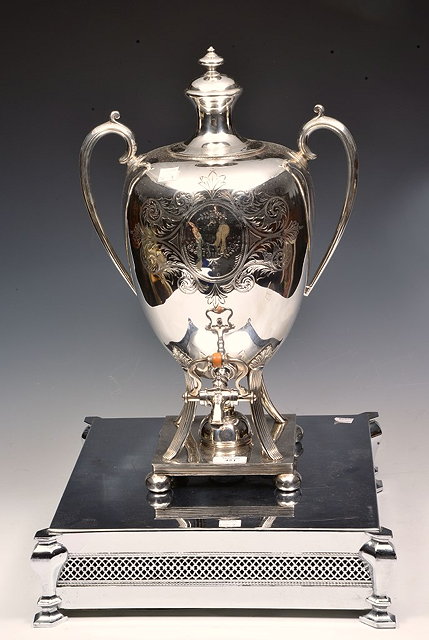 Appraisal: A SILVER PLATED ENGRAVED LARGE SAMOVAR dated and a silver