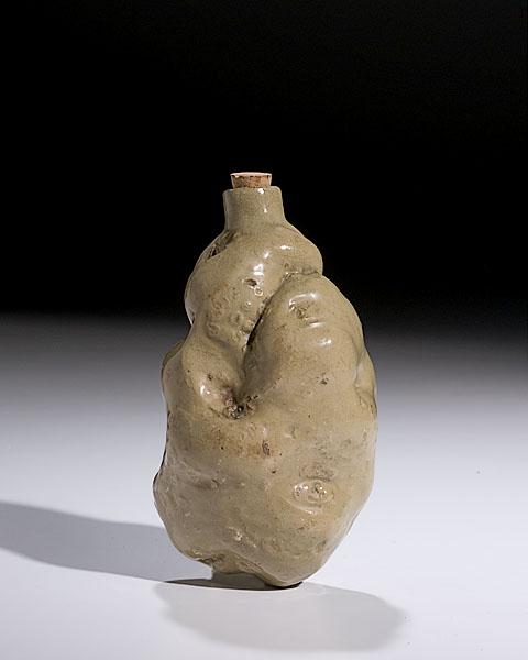 Appraisal: UNUSUAL POTATO FLASK American late th century of earthenware covered