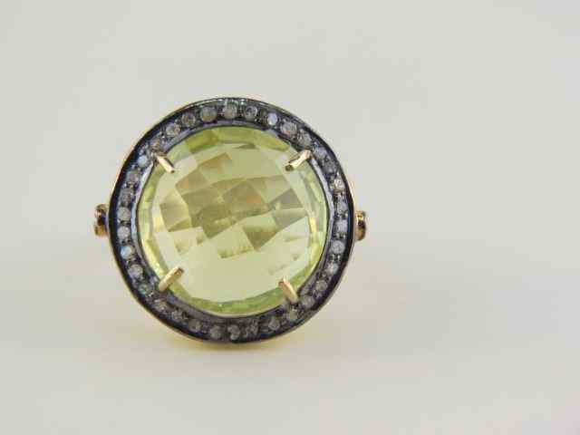 Appraisal: Lemon Citrine Diamond Ring rich faceted carat gem surrounded by