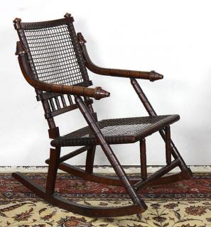 Appraisal: George Hunzinger - Aesthetic Movement rocking chair circa executed in