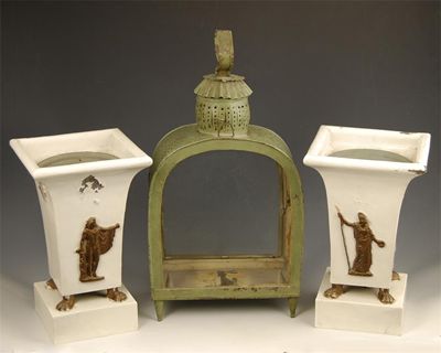 Appraisal: A pair of tole peinte cachepots converted to lamps in