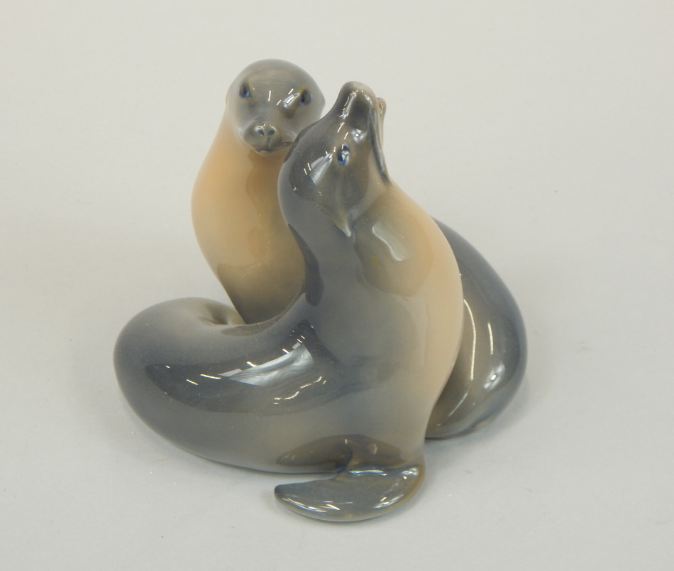 Appraisal: A Royal Copenhagen figure of two seals number cm high