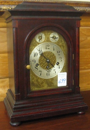 Appraisal: A MAHOGANY CASED CHIMING BRACKET CLOCK Junghans Clock Workshops Germany