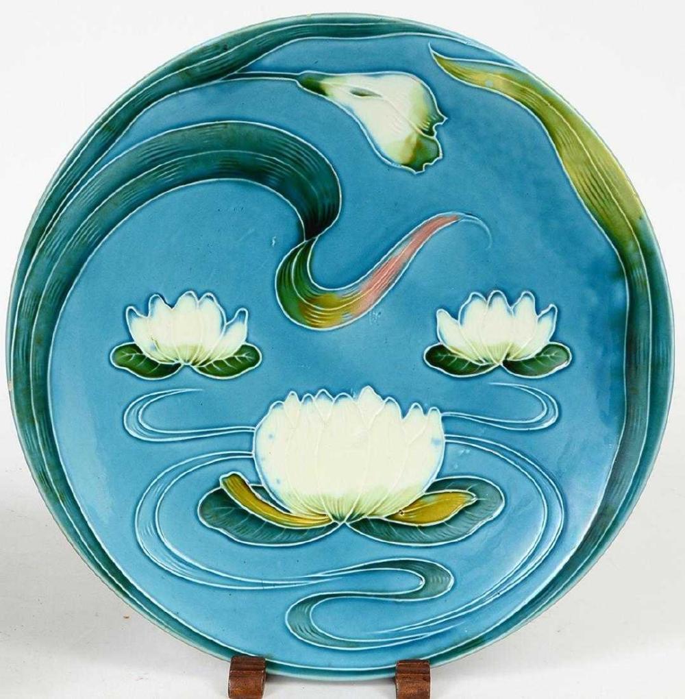 Appraisal: MAJOLICA LOTUS PLATTER BOWLThe bowl with white flowers on a