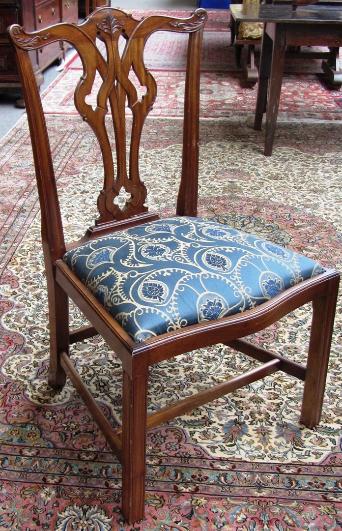 Appraisal: A set of ten th century design mahogany dining chairs