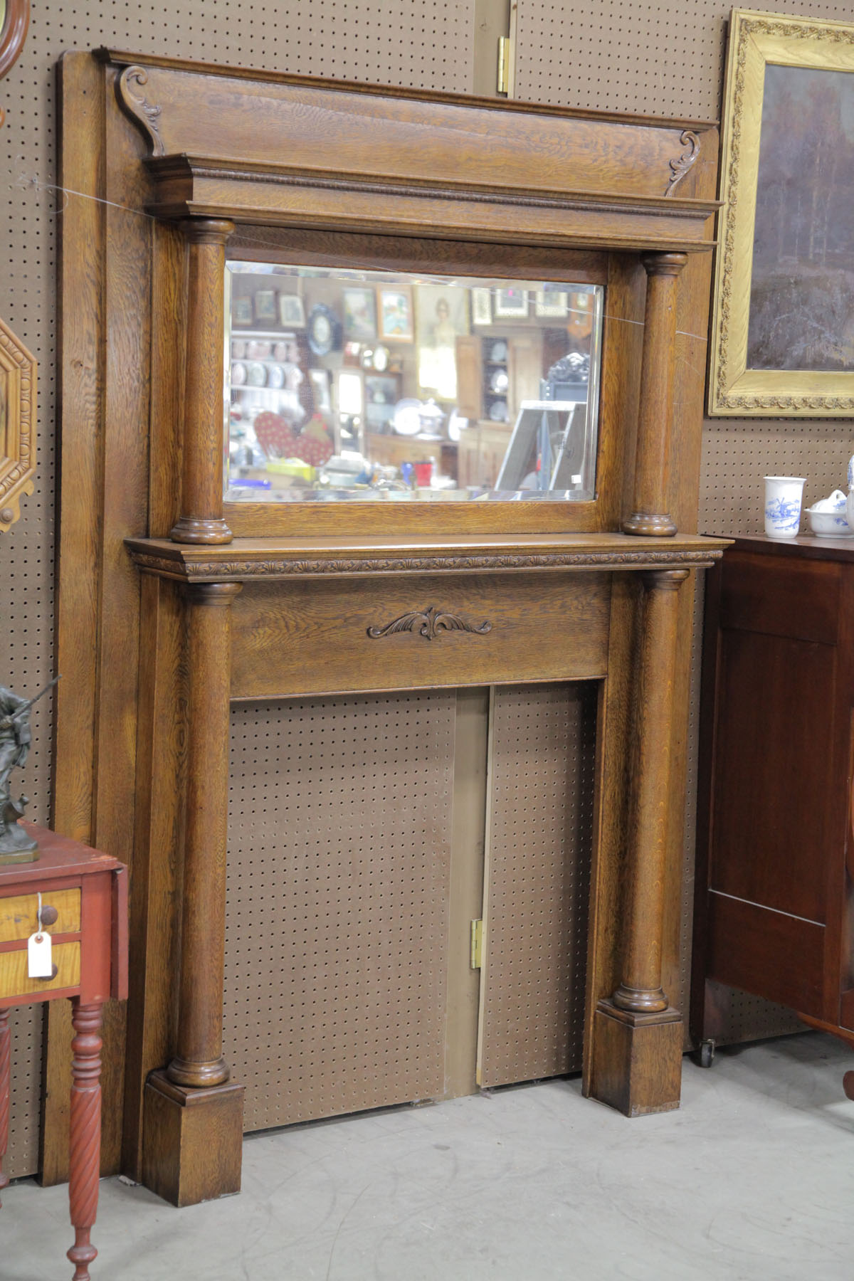 Appraisal: MANTLE American th century Oak mantle with stepped and carved