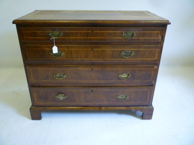 Appraisal: A WALNUT CHEST th century and later the moulded edged