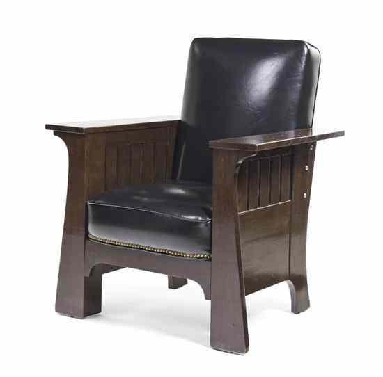 Appraisal: An Arts and Crafts Style Oak Armchair having plank arms