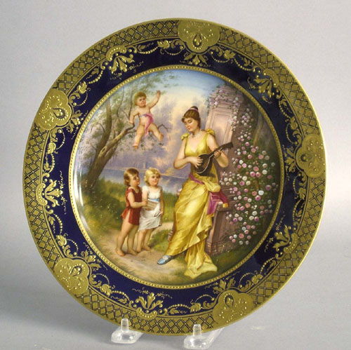 Appraisal: Painted porcelain plate with a maiden and children late th