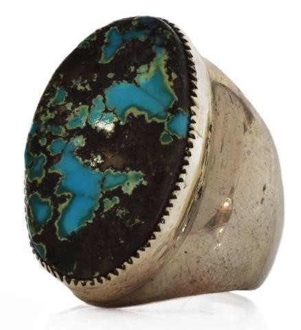 Appraisal: Gents Native American silver content unknown ring with bezel-set turquoise