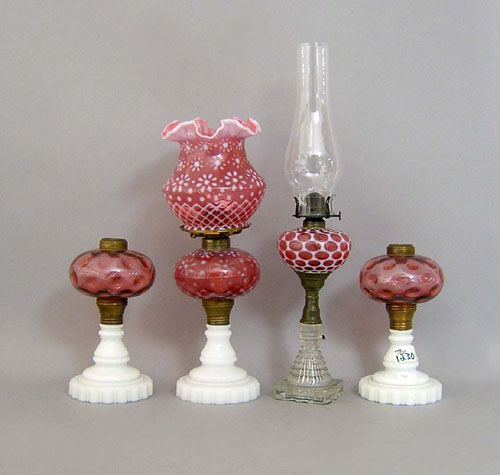 Appraisal: Four ruby glass table lamps