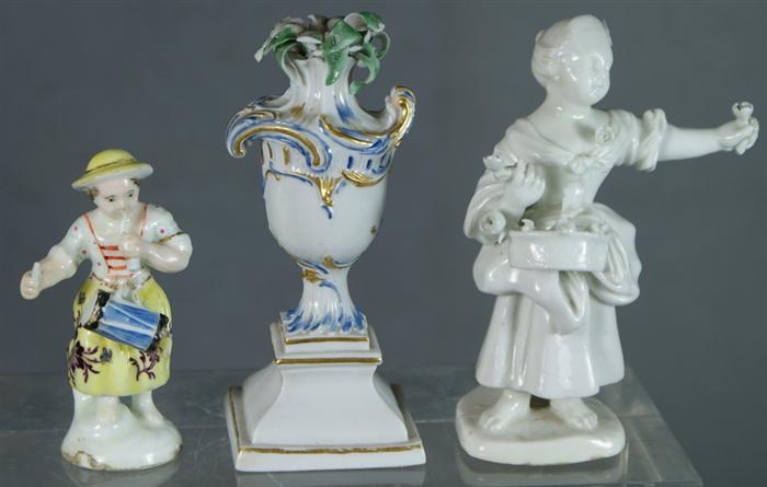 Appraisal: German porcelain figurines of children Nympenburg porcelain vase of flowers