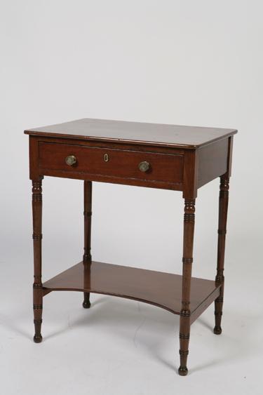 Appraisal: A REGENCY MAHOGANY SIDE TABLE the rectangular top above a