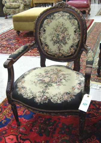 Appraisal: LOUIS XVI STYLE MEDALLION-BACK ARMCHAIR with floral tapestry upholstery