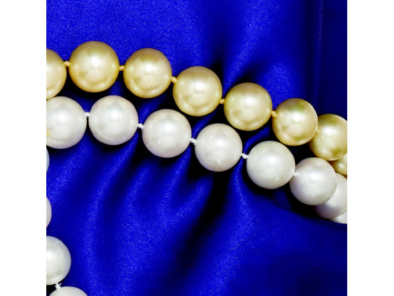 Appraisal: WHITE SOUTH SEA PEARLS Well matched necklace with k white