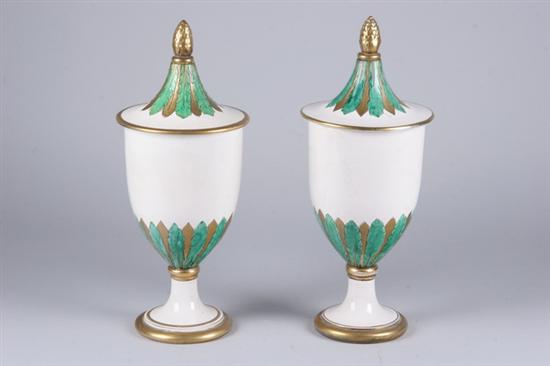 Appraisal: PAIR ITALIAN CERAMIC VASES WITH LIDS White body with green