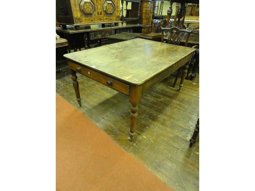 Appraisal: A Victorian mahogany dining table of rectangular form with associated