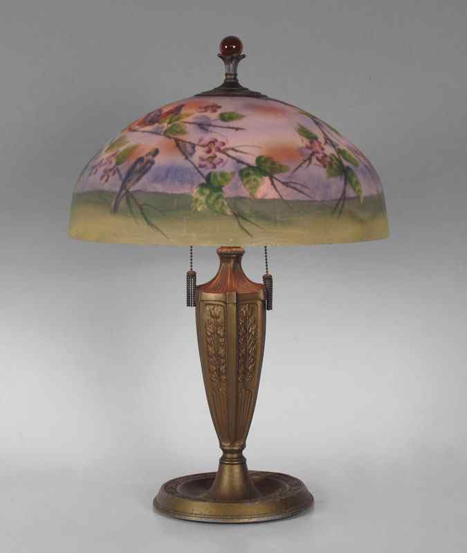 Appraisal: VINTAGE REVERSE PAINTED TABLE LAMP Orange peel textured reverse painted