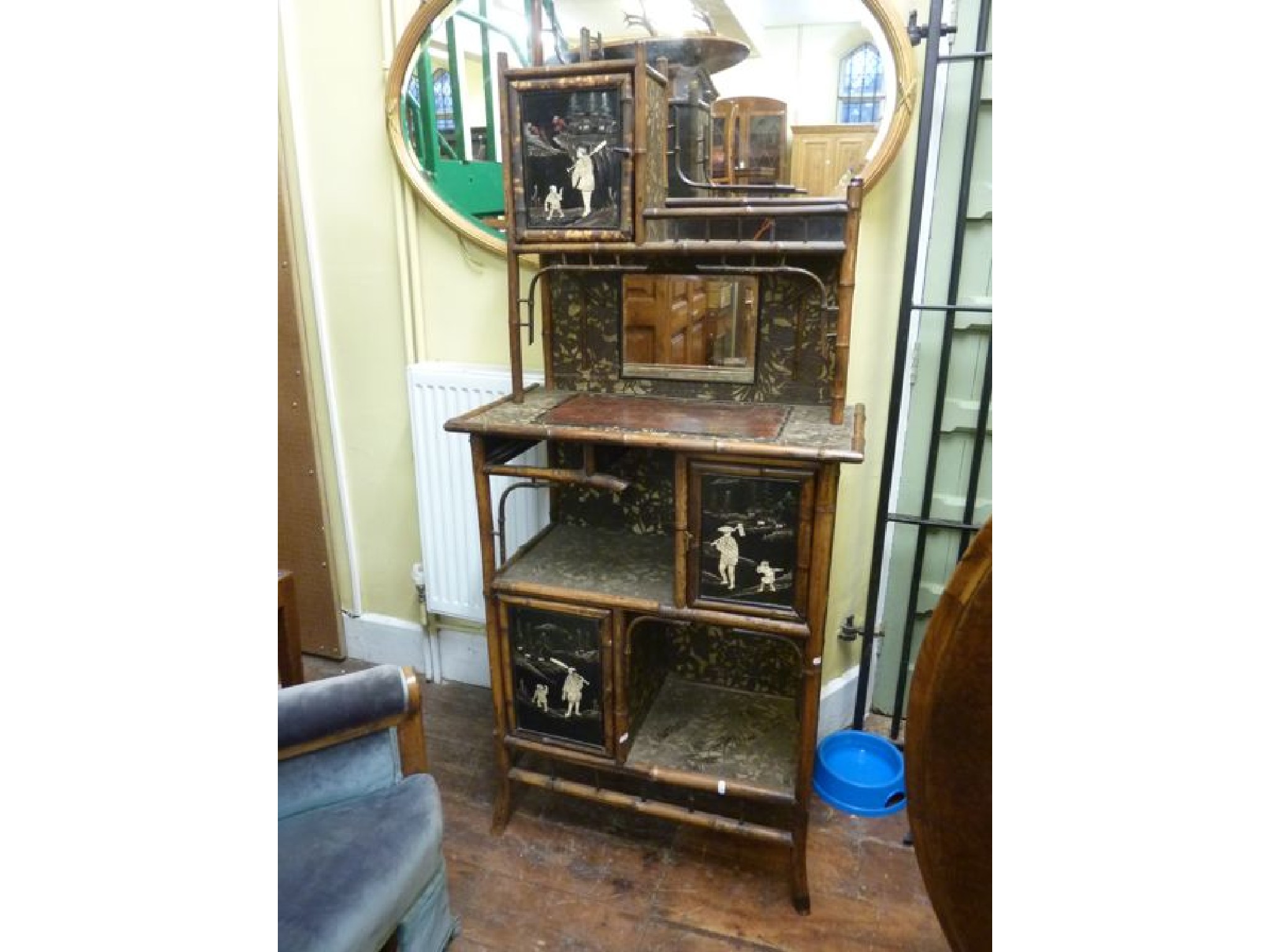 Appraisal: A th century Japanese side cabinet in bamboo on four