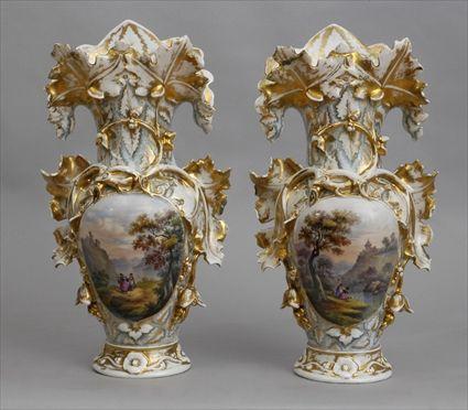 Appraisal: PAIR OF PARIS PORCELAIN VASES Each ovoid bowl with a