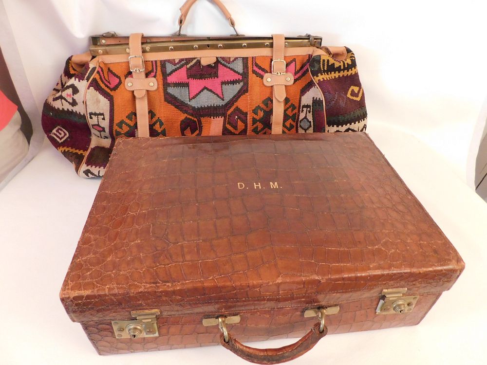 Appraisal: OLD SUITCASES KILIM CARPET LEATHER Lot of vintage suitcases A