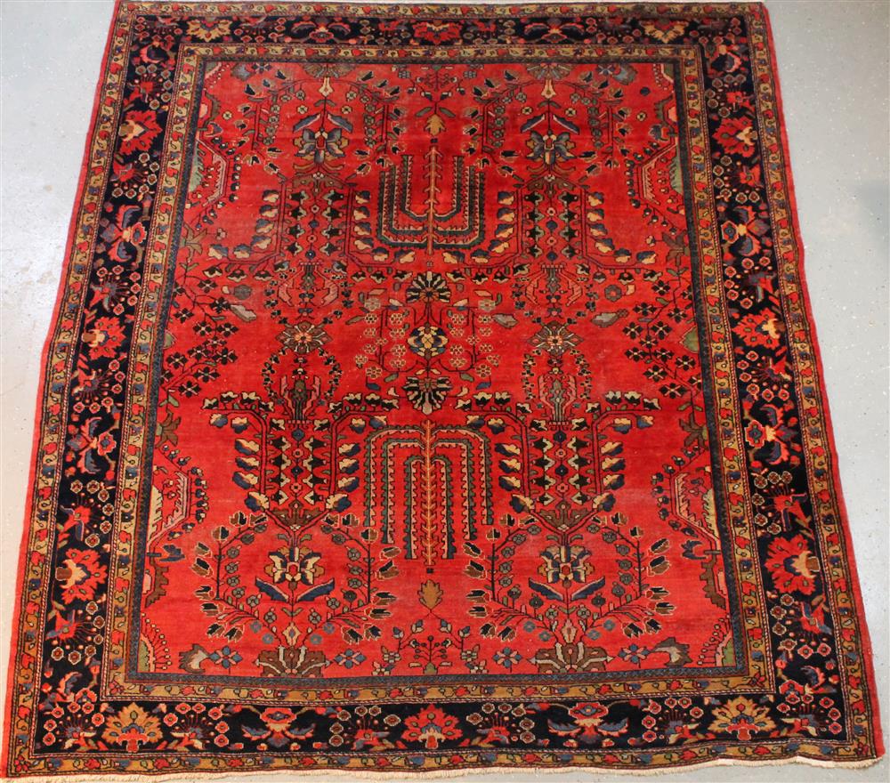 Appraisal: PERSIAN LILAHAN RUG CIRCA having a red ground with repeating