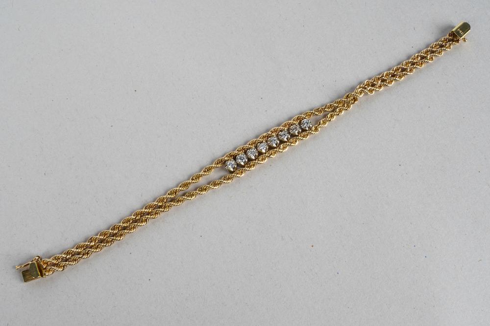 Appraisal: KARAT YELLOW GOLD DIAMOND BRACLETcontaining eight full cut diamonds weighing