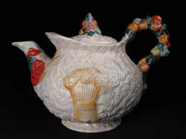 Appraisal: Clarice Cliff art pottery teapot in the Celtic Harvest pattern