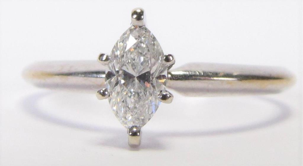 Appraisal: A K white gold ring with a ct marquis diamond