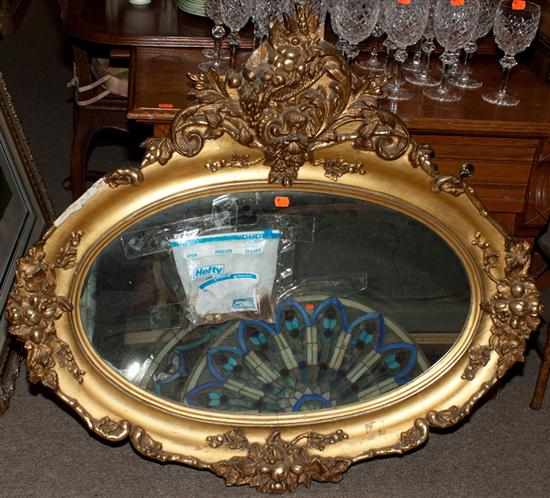 Appraisal: Rococo style giltwood mirror Estimate - All items sold as-is