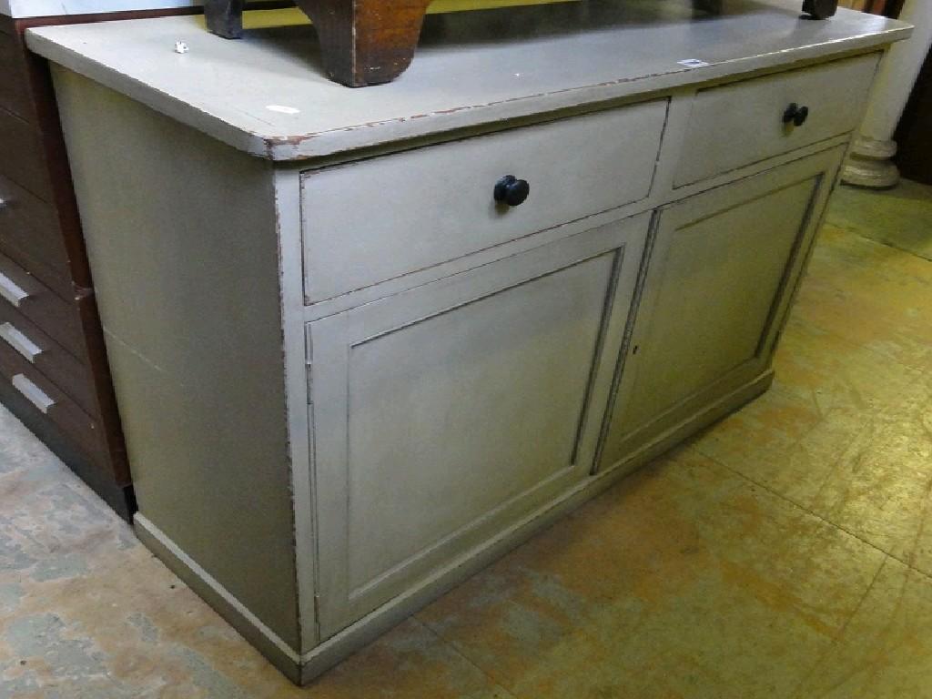 Appraisal: A shabby chic painted dresser base fitted with two frieze